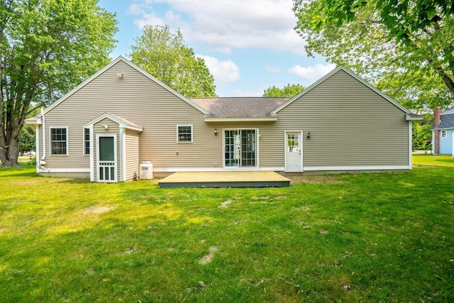 38 Shadagee Rd, Saco, ME 04072 - rear view of house with french doors, a deck, a yard, and a shingled roof