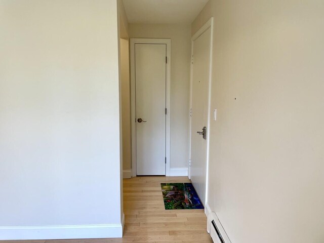 101-2 Waldo Ave Unit 3, Belfast, ME 04915 - corridor with light wood-style floors and baseboards