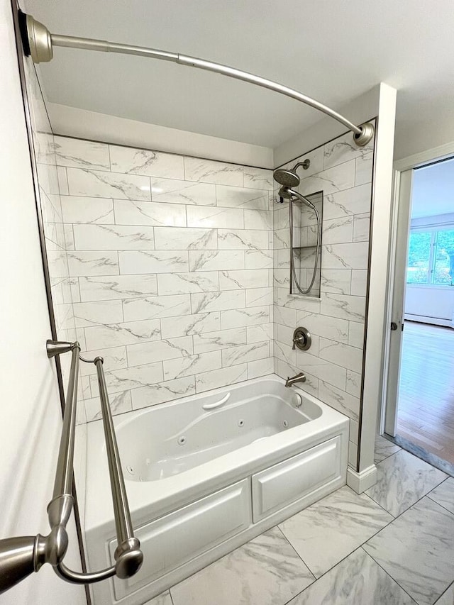 101-2 Waldo Ave Unit 3, Belfast, ME 04915 - bathroom with marble look tiles and a combined bath / shower with jetted tub