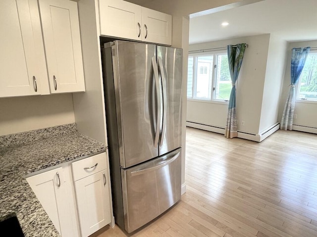 101-2 Waldo Ave Unit 3, Belfast, ME 04915 - kitchen featuring freestanding refrigerator, stone countertops, white cabinets, light wood-type flooring, and recessed lighting