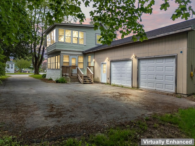 10 Hollingsworth St, Winslow, ME 04901 - view of front of property with asphalt driveway and an attached garage