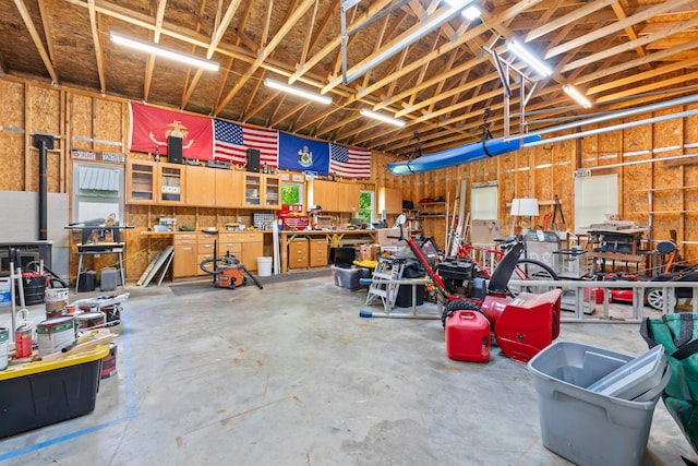 10 Hollingsworth St, Winslow, ME 04901 - garage featuring a workshop area