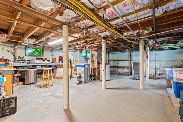 10 Hollingsworth St, Winslow, ME 04901 - unfinished below grade area with a heating unit