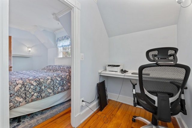 10 Hollingsworth St, Winslow, ME 04901 - bedroom featuring wood finished floors, an office area, crown molding, and baseboards