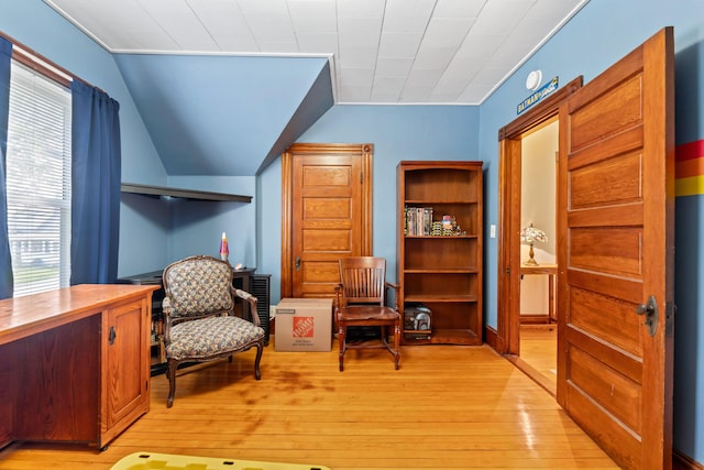 10 Hollingsworth St, Winslow, ME 04901 - living area with light wood-style flooring, plenty of natural light, a desk, and vaulted ceiling