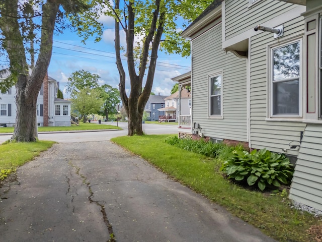 10 Hollingsworth St, Winslow, ME 04901 - view of asphalt road with a residential view