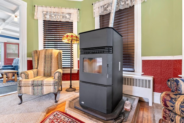 10 Hollingsworth St, Winslow, ME 04901 - sitting room featuring radiator, hardwood / wood-style flooring, wainscoting, and baseboards