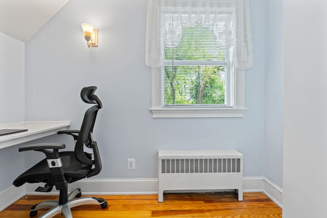 10 Hollingsworth St, Winslow, ME 04901 - office space with radiator, wood finished floors, and baseboards