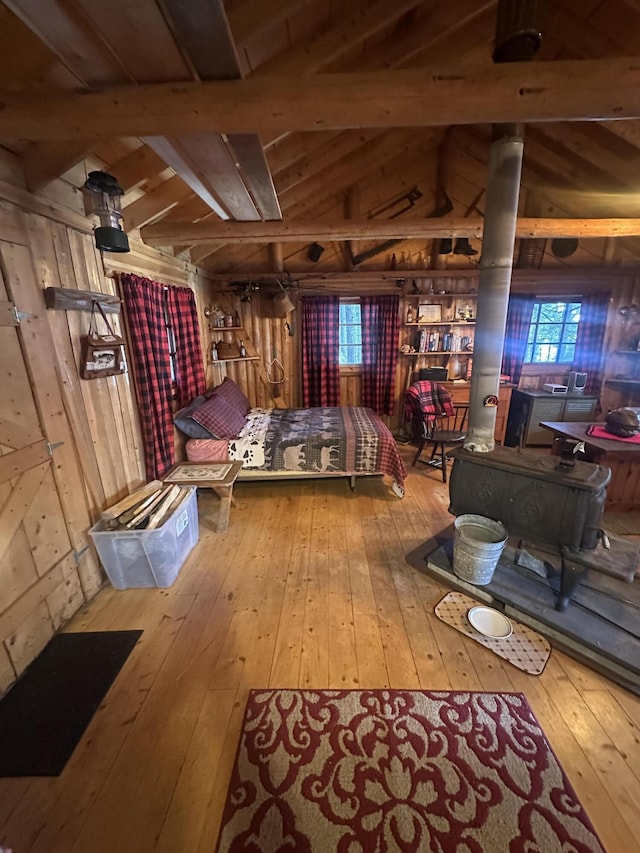 30 Cove View Ln Unit T3, Indian Purchase Twp, ME 04462 - bedroom with wood-type flooring and wooden walls