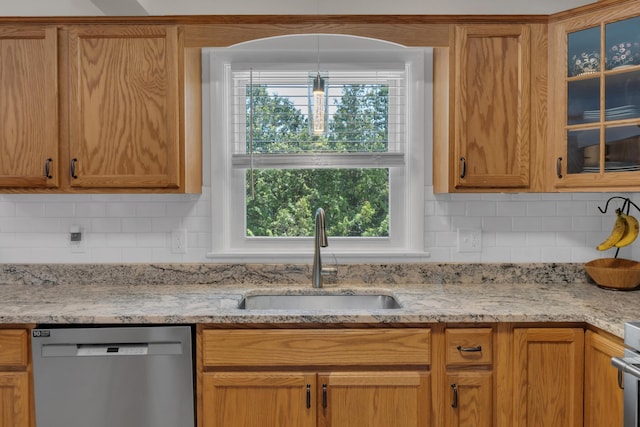 6 Goff Ave, Lewiston, ME 04240 - kitchen with stainless steel dishwasher, a sink, decorative backsplash, glass insert cabinets, and healthy amount of natural light