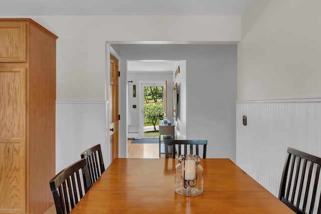 6 Goff Ave, Lewiston, ME 04240 - dining area with a wainscoted wall and baseboard heating