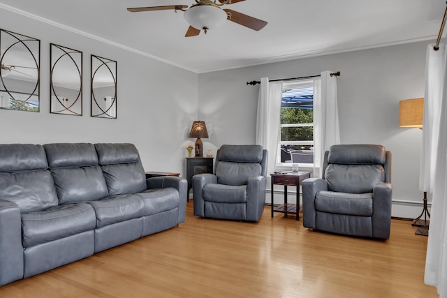 6 Goff Ave, Lewiston, ME 04240 - living room featuring ceiling fan, wood finished floors, crown molding, baseboard heating, and a baseboard radiator