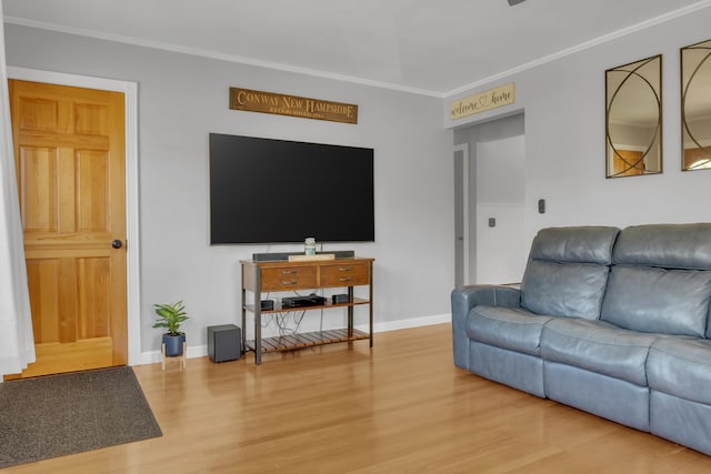 6 Goff Ave, Lewiston, ME 04240 - living area with wood finished floors, ornamental molding, and baseboards