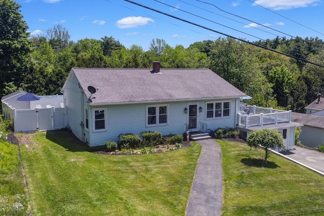 6 Goff Ave, Lewiston, ME 04240 - view of front of home with a gate, roof with shingles, and a chimney