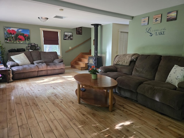40 Justin Ln, Hermon, ME 04401 - living room with light wood finished floors and stairway