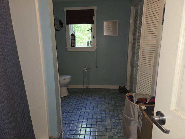 40 Justin Ln, Hermon, ME 04401 - bathroom featuring toilet and baseboards