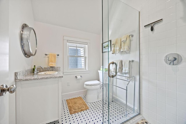 7 First St, Biddeford, ME 04006 - bathroom featuring a shower stall, vanity, toilet, baseboards, and tile patterned flooring