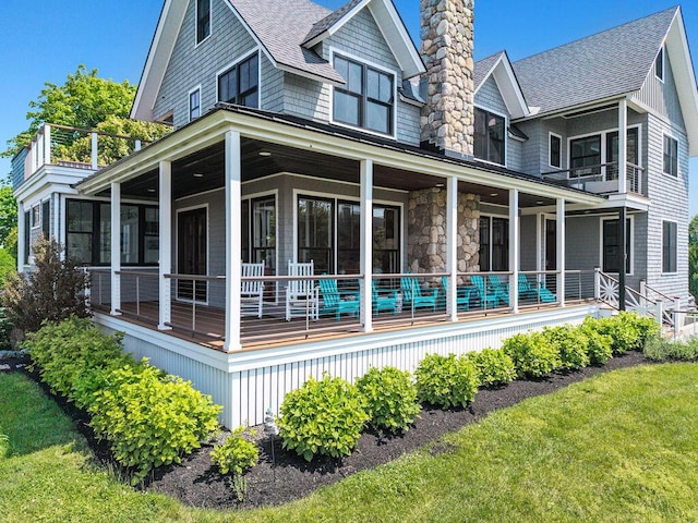7 First St, Biddeford, ME 04006 - view of property exterior with a shingled roof, a chimney, a yard, and covered porch