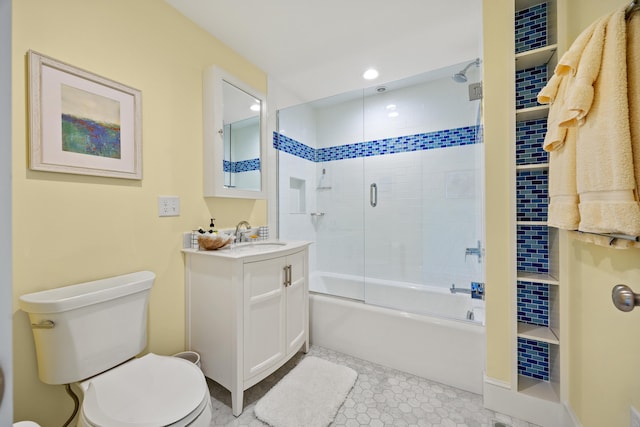7 First St, Biddeford, ME 04006 - bathroom featuring toilet, vanity, enclosed tub / shower combo, and recessed lighting