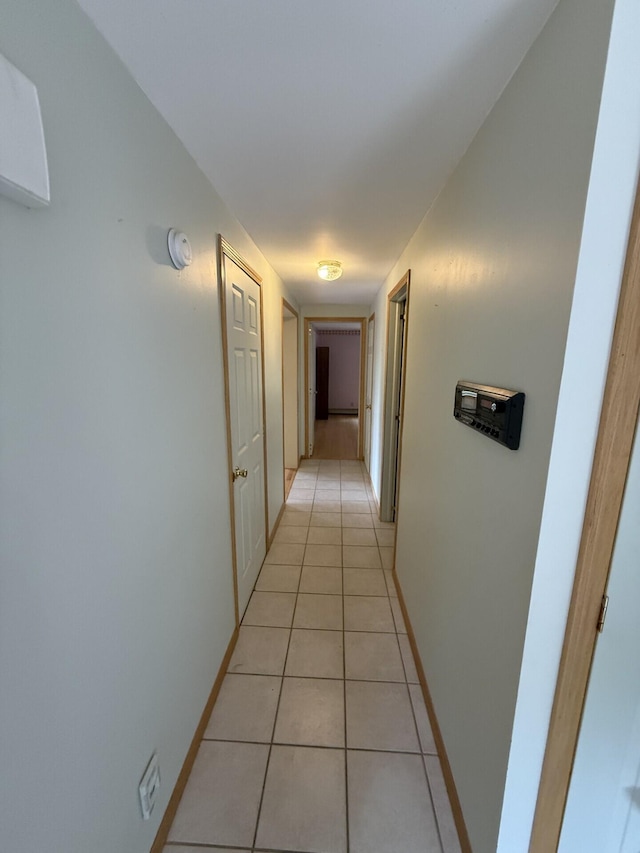 156 Lakeshore Dr, Leeds, ME 04263 - hallway featuring light tile patterned floors and baseboards