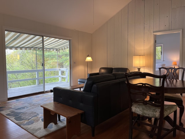 170 Molyneaux Rd, Camden, ME 04843 - living area with lofted ceiling, wood finished floors, plenty of natural light, and wooden walls