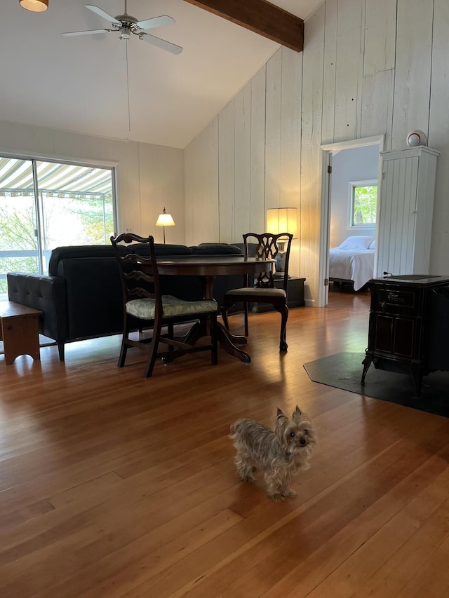 170 Molyneaux Rd, Camden, ME 04843 - dining space with healthy amount of natural light, beam ceiling, high vaulted ceiling, hardwood / wood-style flooring, and ceiling fan