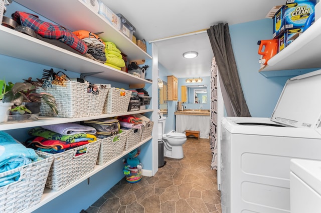 54 Middle Rd, Augusta, ME 04330 - pantry featuring washer and clothes dryer