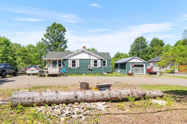 54 Middle Rd, Augusta, ME 04330 - bungalow-style house with an outbuilding and a garage