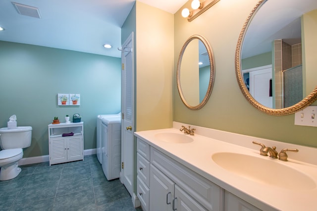 12 Hixon Hill Dr, Woolwich, ME 04579 - bathroom with double vanity, washer and dryer, recessed lighting, tile patterned floors, and a shower