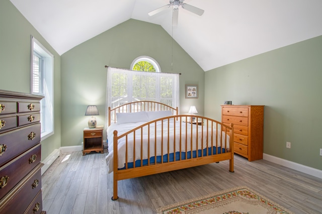 12 Hixon Hill Dr, Woolwich, ME 04579 - bedroom with lofted ceiling, wood finished floors, and a ceiling fan