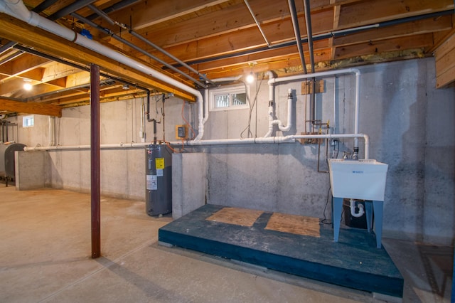 12 Hixon Hill Dr, Woolwich, ME 04579 - basement with electric water heater and oil tank