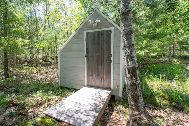 12 Hixon Hill Dr, Woolwich, ME 04579 - view of shed with a forest view