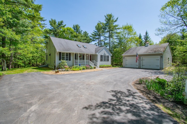 12 Hixon Hill Dr, Woolwich, ME 04579 - ranch-style home with covered porch, driveway, and an outbuilding