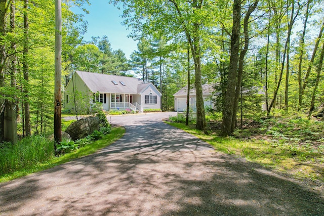 12 Hixon Hill Dr, Woolwich, ME 04579 - view of front facade with an outbuilding and a porch