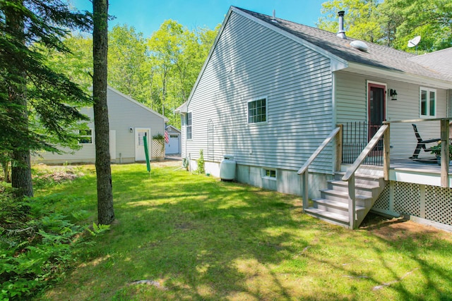12 Hixon Hill Dr, Woolwich, ME 04579 - view of home's exterior with a yard and a wooden deck