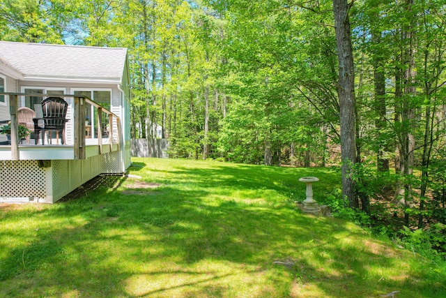 12 Hixon Hill Dr, Woolwich, ME 04579 - view of green lawn with a deck