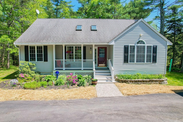 12 Hixon Hill Dr, Woolwich, ME 04579 - view of front facade with a porch and roof with shingles