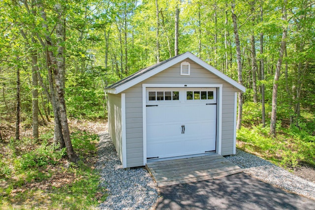 12 Hixon Hill Dr, Woolwich, ME 04579 - garage with a forest view