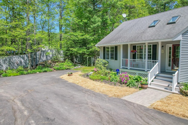 12 Hixon Hill Dr, Woolwich, ME 04579 - view of front of home featuring a porch and a shingled roof