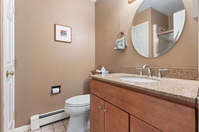 3 Blueberry Rd Unit 3, Yarmouth, ME 04096 - bathroom with baseboard heating, vanity, tile patterned flooring, toilet, and baseboards