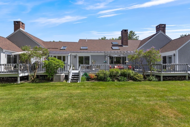 3 Blueberry Rd Unit 3, Yarmouth, ME 04096 - rear view of property with a pergola, a lawn, and a deck