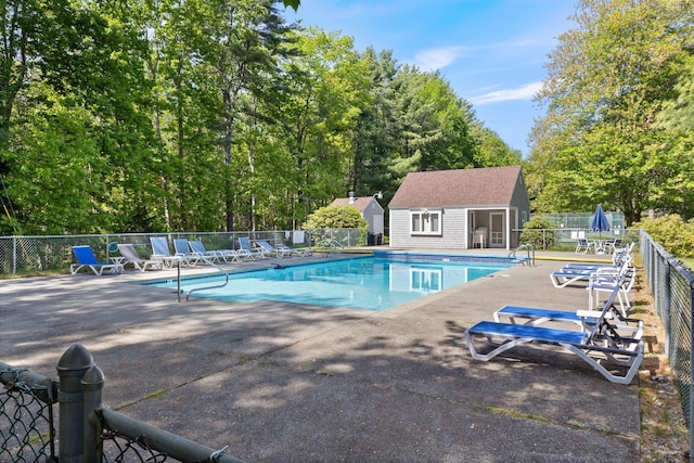 3 Blueberry Rd Unit 3, Yarmouth, ME 04096 - community pool featuring a patio and an outbuilding