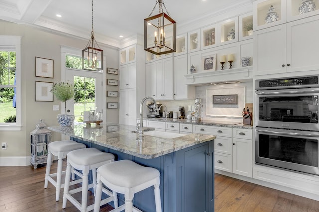 18 Forecaster Way, Scarborough, ME 04074 - kitchen with double oven, a sink, ornamental molding, white cabinetry, and recessed lighting