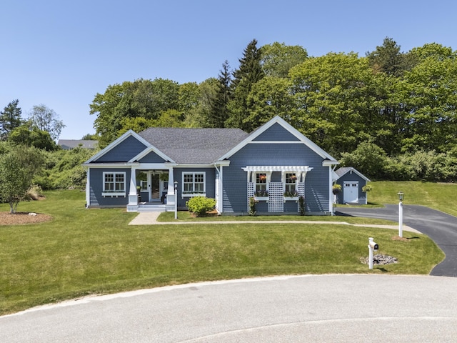 18 Forecaster Way, Scarborough, ME 04074 - craftsman-style home featuring a front lawn, asphalt driveway, covered porch, and a detached garage