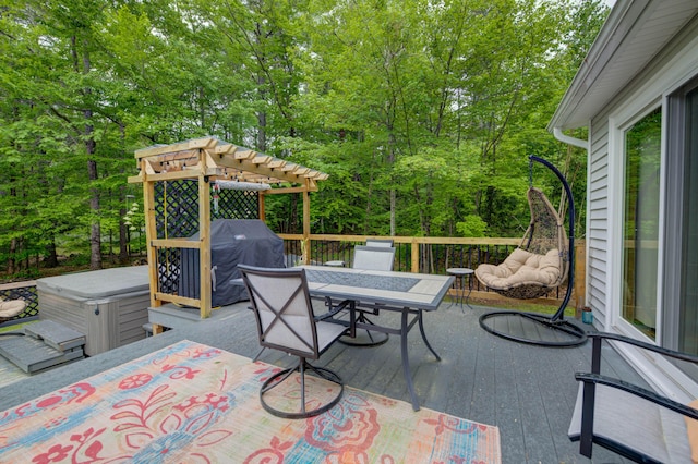 40 Sanborn St, Gorham, ME 04038 - wooden deck featuring a hot tub, outdoor dining space, grilling area, and view of wooded area
