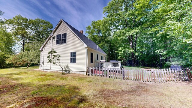471 Owls Nest Rd, Shapleigh, ME 04076 - view of side of home featuring a chimney, a wooden deck, and a shingled roof