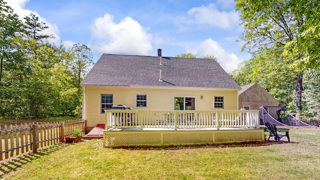 471 Owls Nest Rd, Shapleigh, ME 04076 - back of property with a deck, a shingled roof, and a chimney