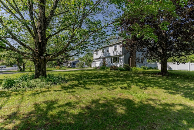 110 Elm St, North Berwick, ME 03906 - view of yard with a garage and a balcony