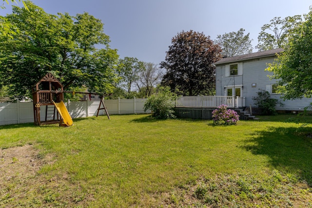 110 Elm St, North Berwick, ME 03906 - view of yard featuring a playground and a wooden deck