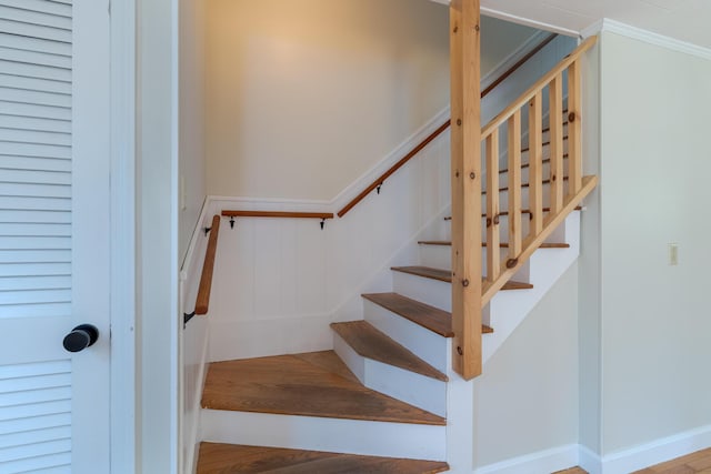 110 Elm St, North Berwick, ME 03906 - stairway with ornamental molding and wood finished floors